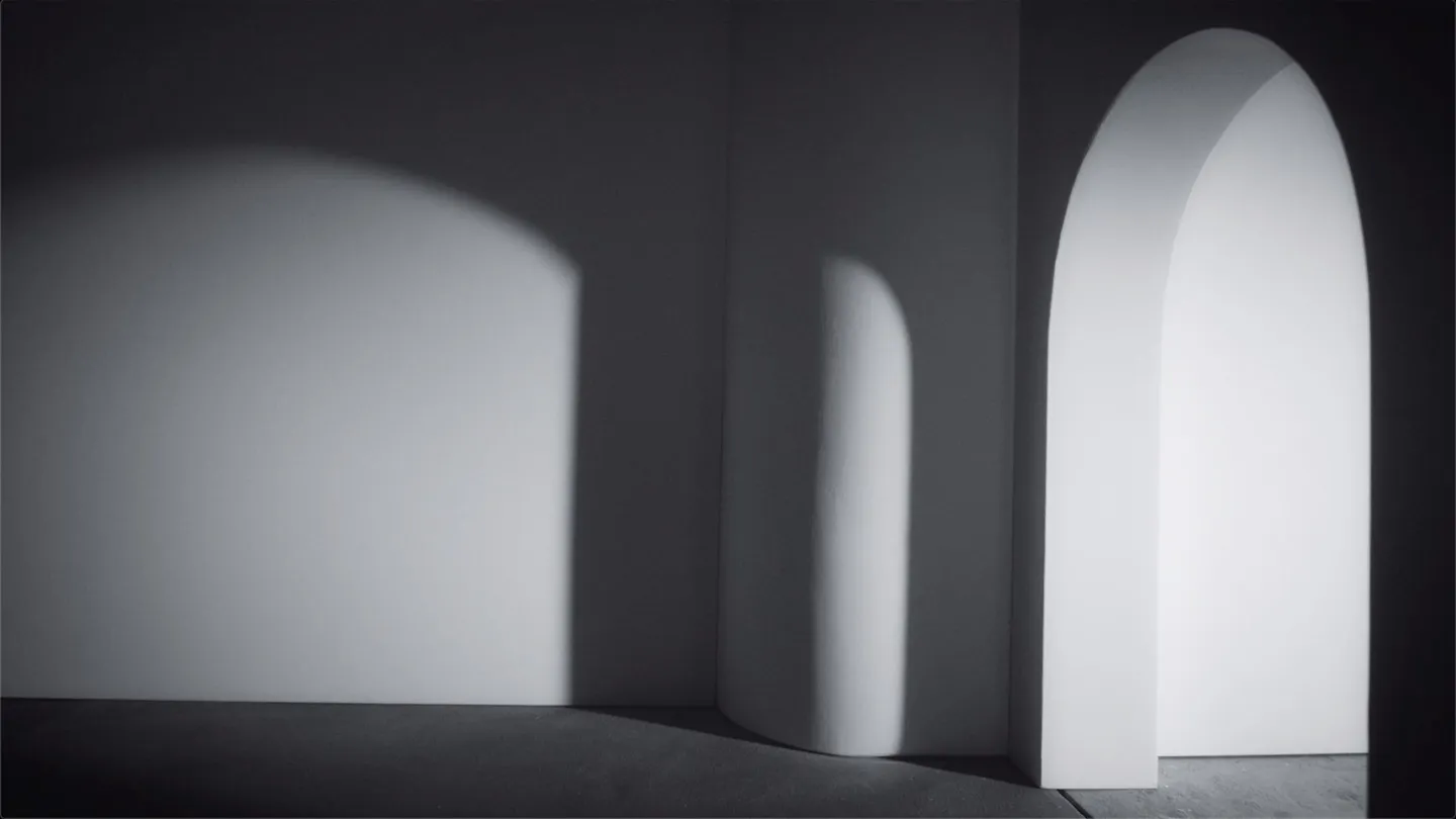 Arches and light in a white room